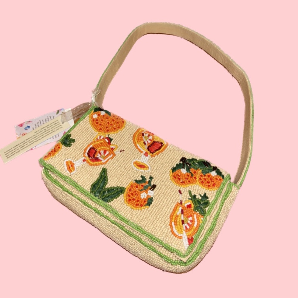 NWT Viral Aperol Spritz
Beaded shoulder Bag